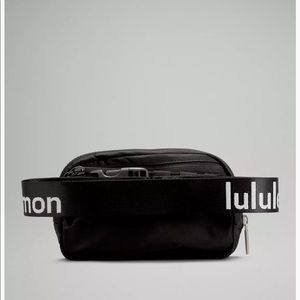 Lululemon Everywhere belt bag! NEW black and white . White Lululemon logo